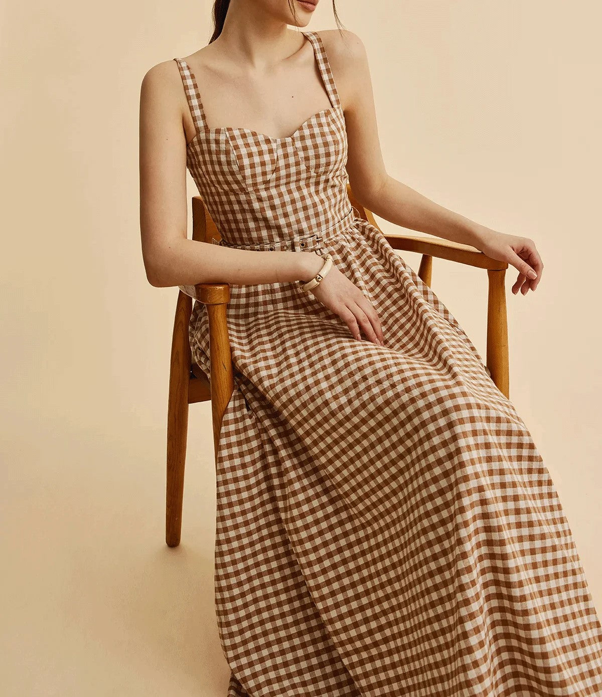 Dress with grid print and belt