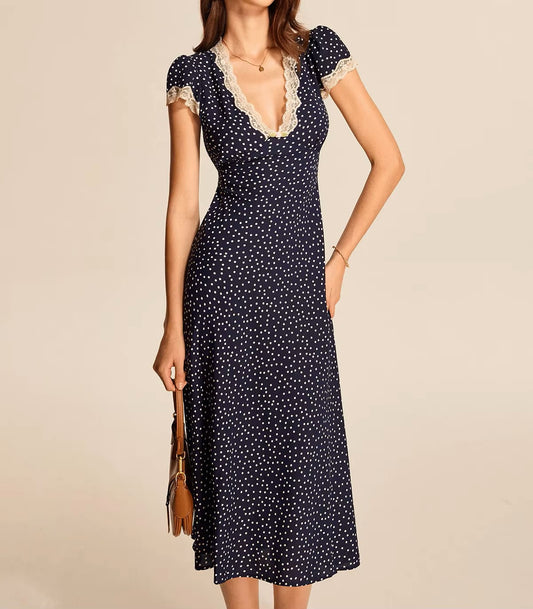 Polka dot dress with lace neckline