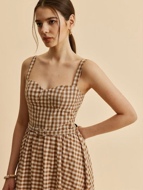 Dress with grid print and belt