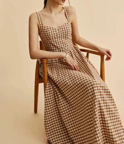 Dress with grid print and belt