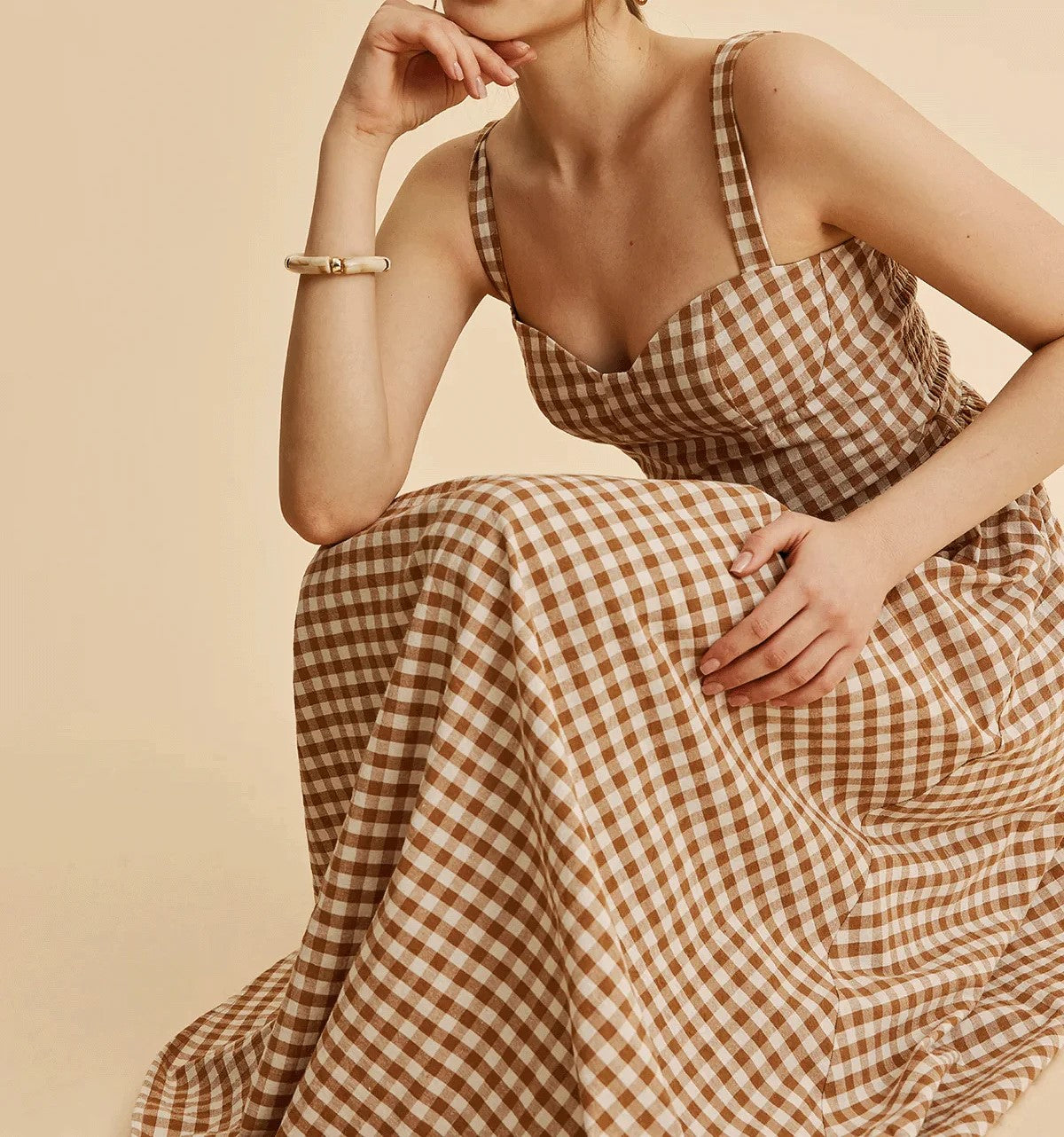 Dress with grid print and belt