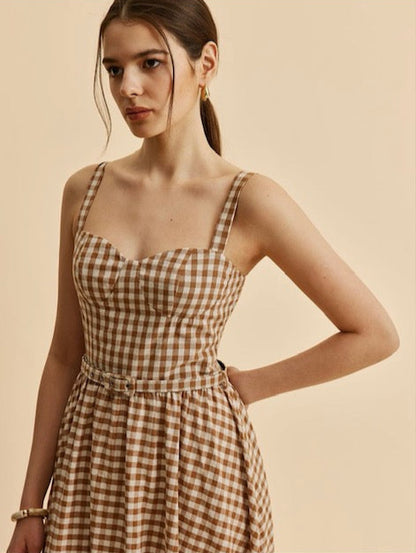 Dress with grid print and belt